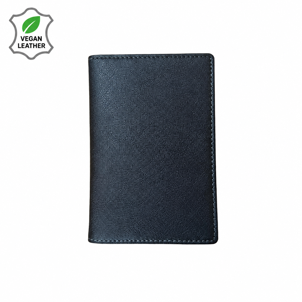 A black vegan leather passport cover or card holder, shown flat against a white background with a 'VEGAN LEATHER' badge in the top-left corner.