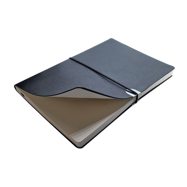 A slim black notebook with a textured cover and an elastic closure band, shown open to reveal a light beige interior page, on a solid white background.