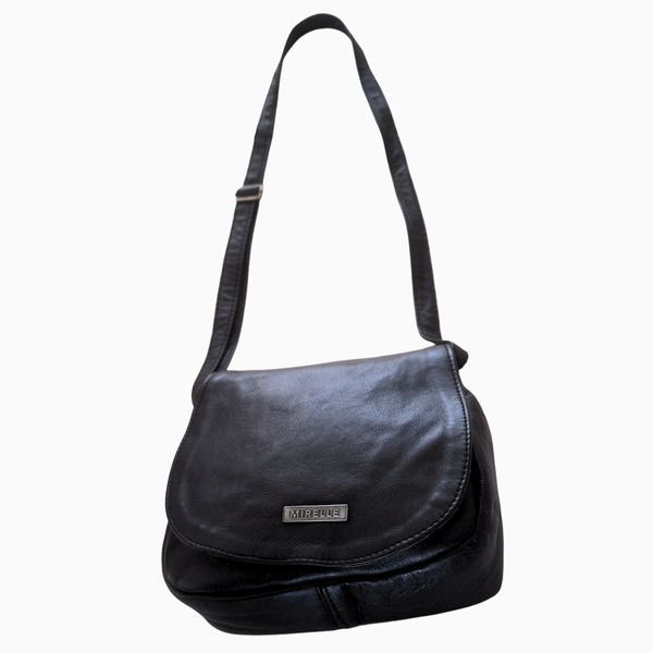 Black leather handbag with a strap on a white background