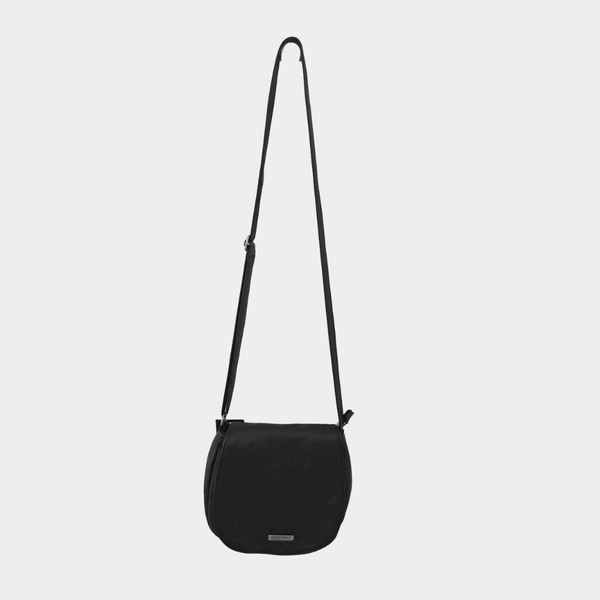 Black crossbody bag on a light gray background
