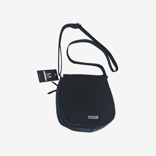 Black crossbody bag with a strap on a light gray background